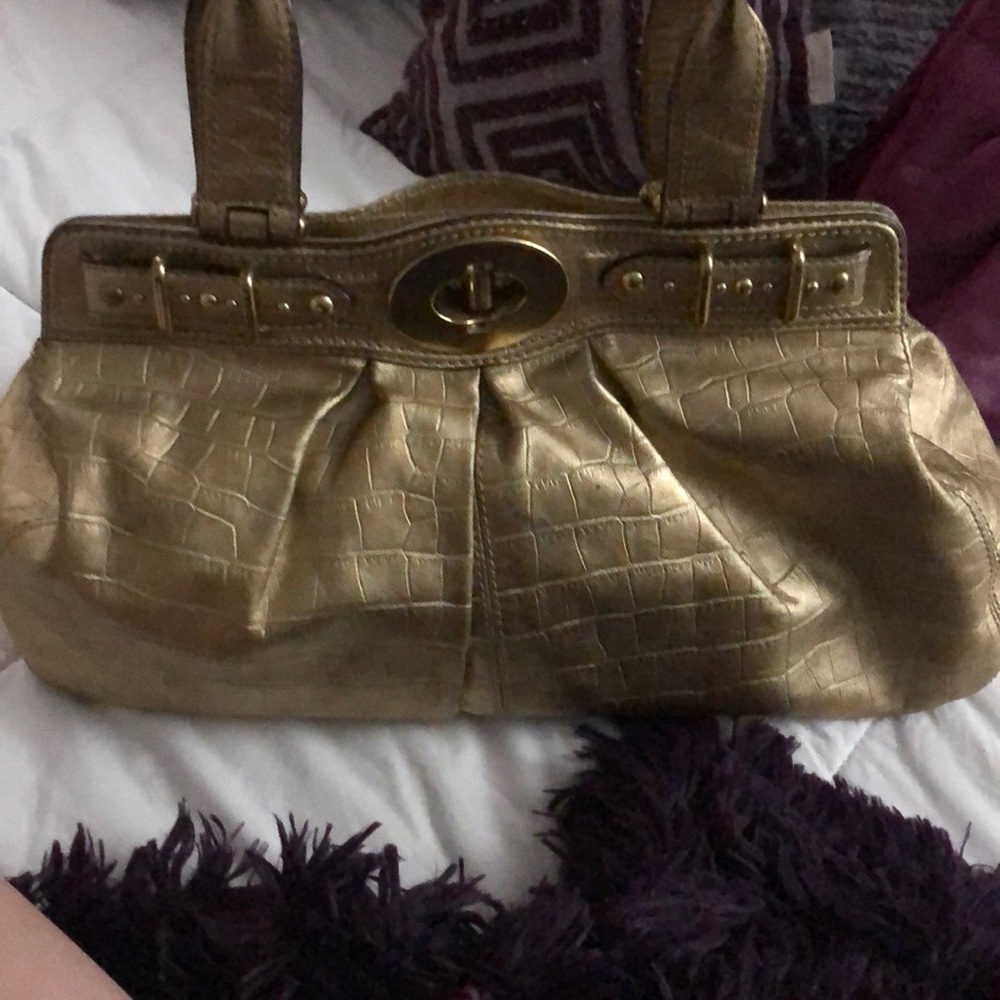 Golden coach handbag